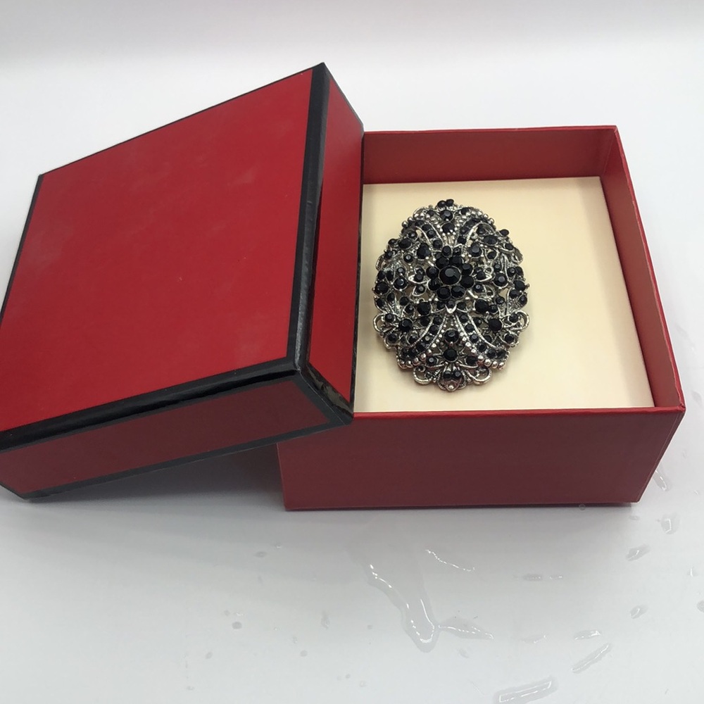 Elegant Black and Silver Tone Brooch